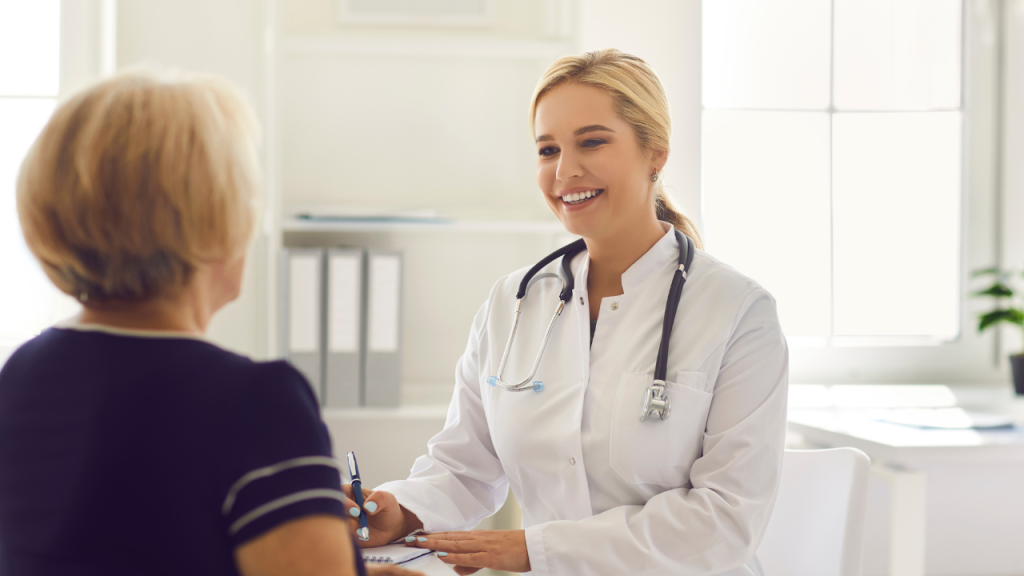 Image of a doctor at Modern Primary Healthcare in Greater Houston, attentively treating a patient during a primary care visit